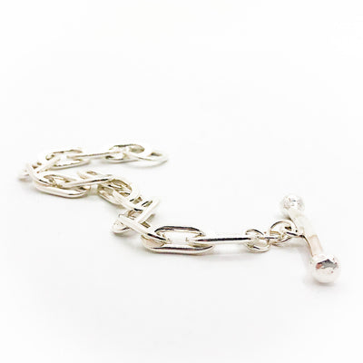 side angle view of Sterling Tow Truck Junior Bracelet by Judie Raiford