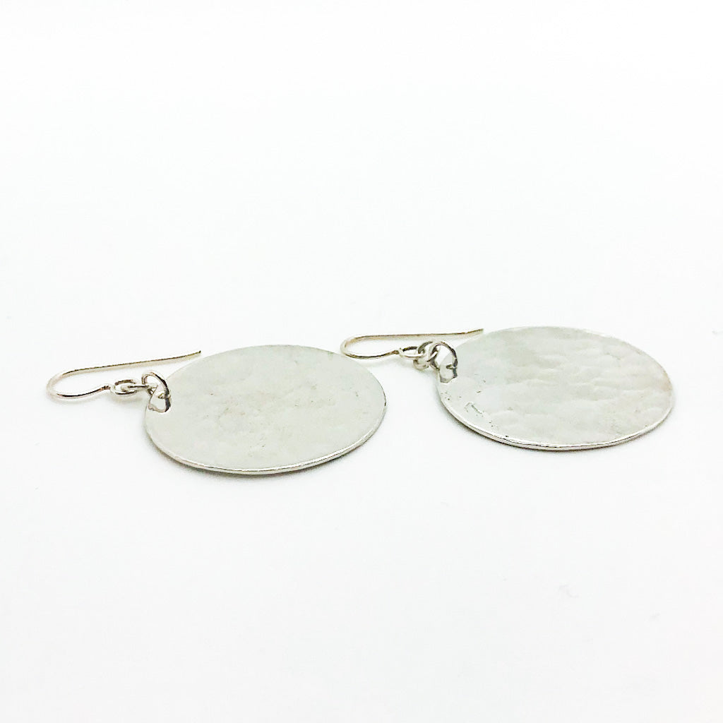 side angle view of Sterling Lynne Disc Earrings by Judie Raiford