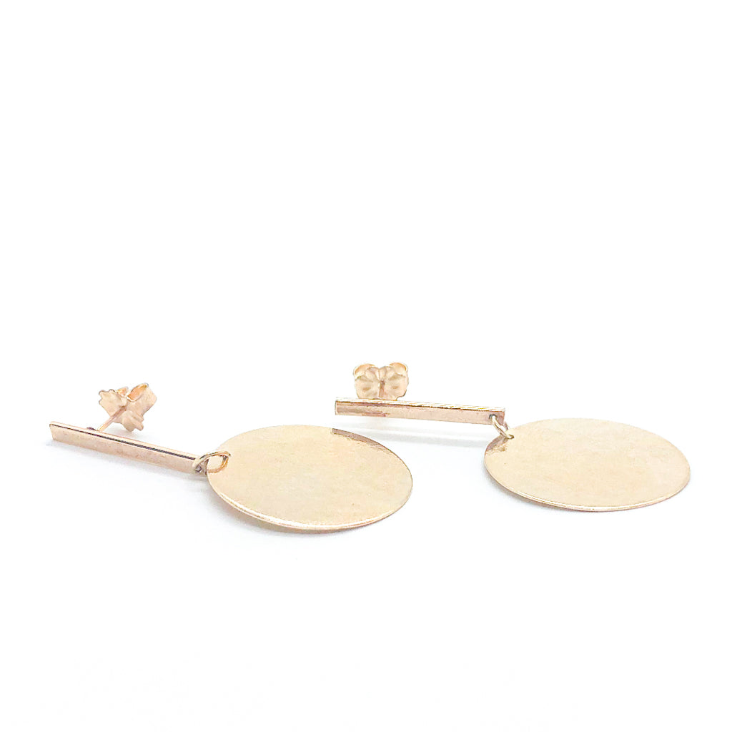 side angle view of 14k Gold Filled Skipper Dot Earrings by Judie Raiford