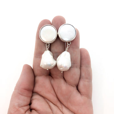 Sterling Irina Earrings with White Pearls by Judie Raiford held in hand
