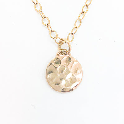detail view of 14k Gold Filled Ball Pein Mini Flat Circle Disc Necklace by Judie Raiford