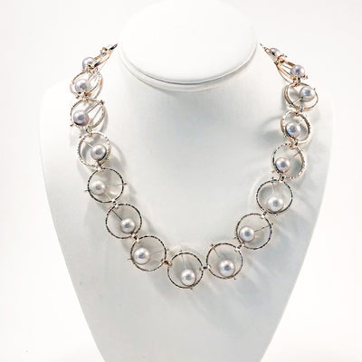 Sterling Not Naught Round Necklace with Gray Pearls by Judie Raiford on white display bust