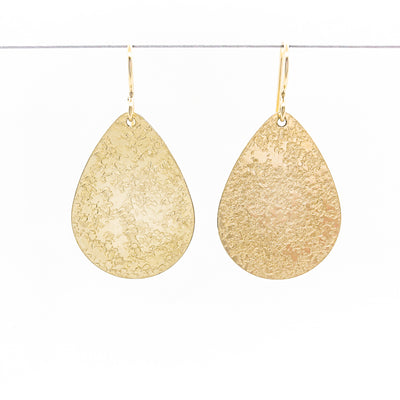 14k Gold Filled Mom's Hammer Flat Pear Earrings by Judie Raiford hanging on a wire