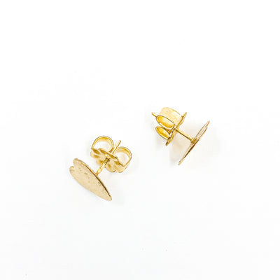 over top view of 14k Gold Filled Paper Textured Heart Stud Earrings by Judie Raiford