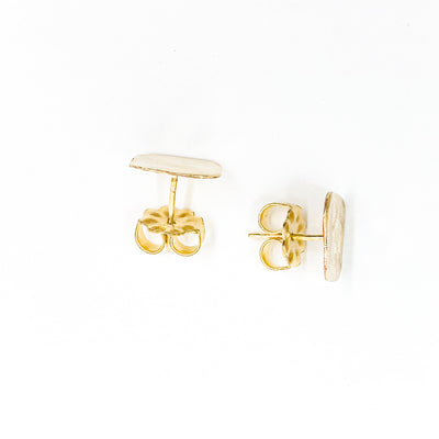 over top view of 14k Gold Filled Mom's Hammered Square Stud Earrings by Judie Raiford