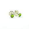 side angle view of 6mm Peridot Cabochon Stud Earrings by Judie Raiford