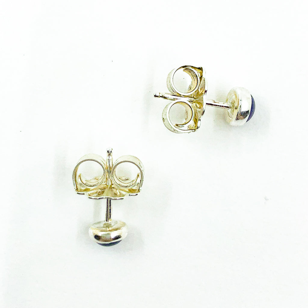 over top view of 6mm Abalone Cabochon Stud Earrings by Judie Raiford