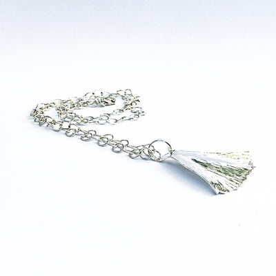 side angle view of Large Sterling Ginkgo Ra Ra Necklace by Judie Raiford