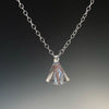 detail view of Large Sterling Ginkgo Ra Ra Necklace by Judie Raiford against black