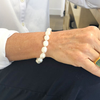 Sterling White Small Baroque Pearl Bracelet with Heart Clasp by Judie Raiford worn on model