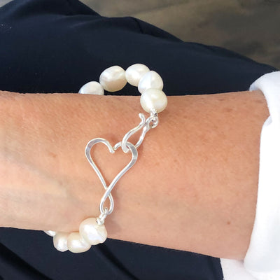 detail view of clasp on Sterling White Small Baroque Pearl Bracelet with Heart Clasp by Judie Raiford
