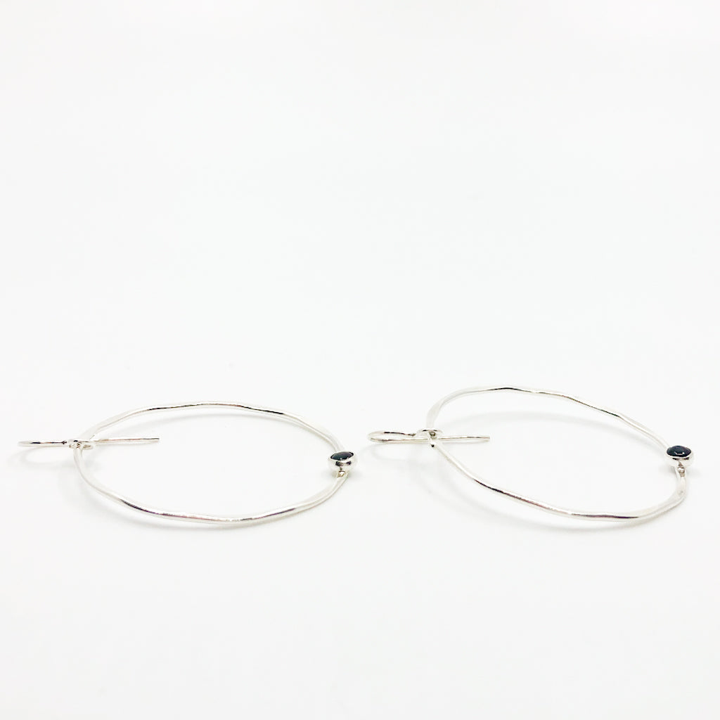 side angle view of Sterling Orbit Earrings with Black Onyx by Judie Raiford