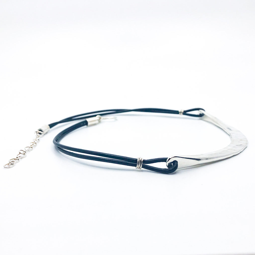 side angle view of Sterling Half Naught Necklace with Leather Cord by Judie Raiford