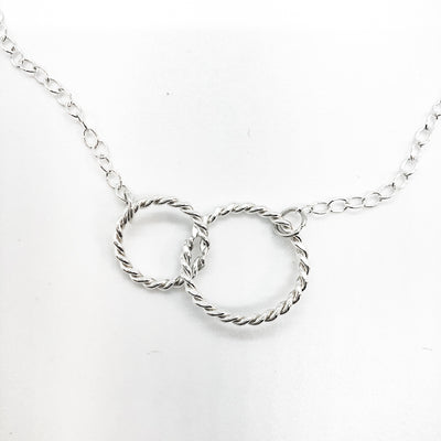 detail view of sterling silver Double Twist Maggie Necklace by Judie Raiford