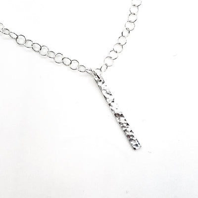 detail view of hammered bar pendant in sterling silver Large Hammered Bar Necklace by Judie Raiford