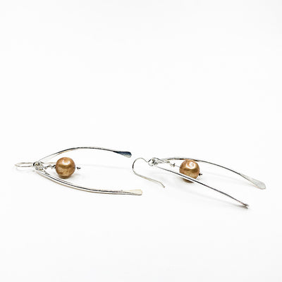 side angle view of Sterling Wishbone Earrings with Champagne Pearls by Judie Raiford