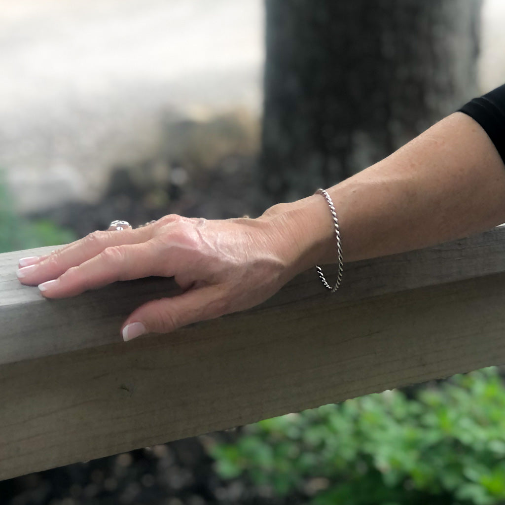 Double Twist Oxidized Sterling Bangle by Judie Raiford on model