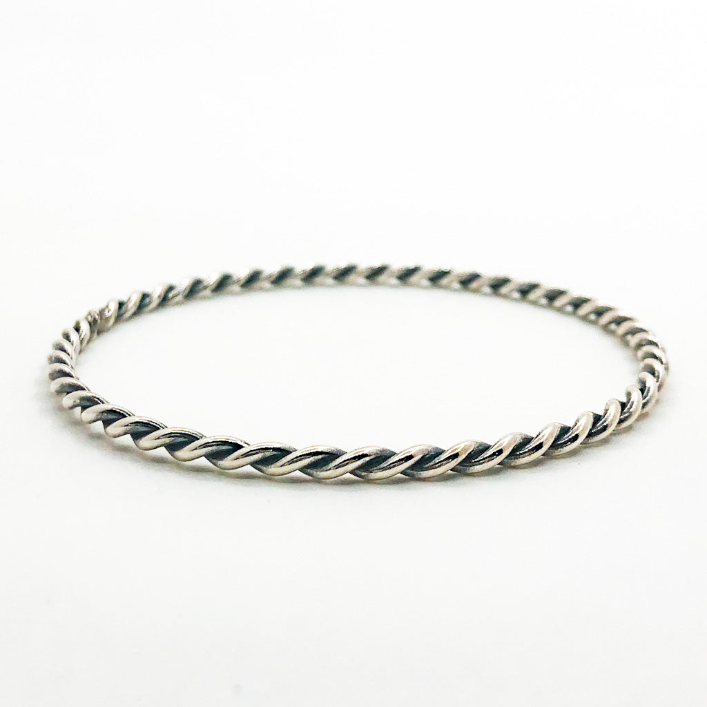 Double Twist Oxidized Sterling Bangle by Judie Raiford