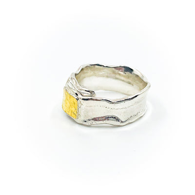 left side view of size 10.5 Men's Sterling and 22k Anticlastic Deckled Band Ring by Judie Raiford