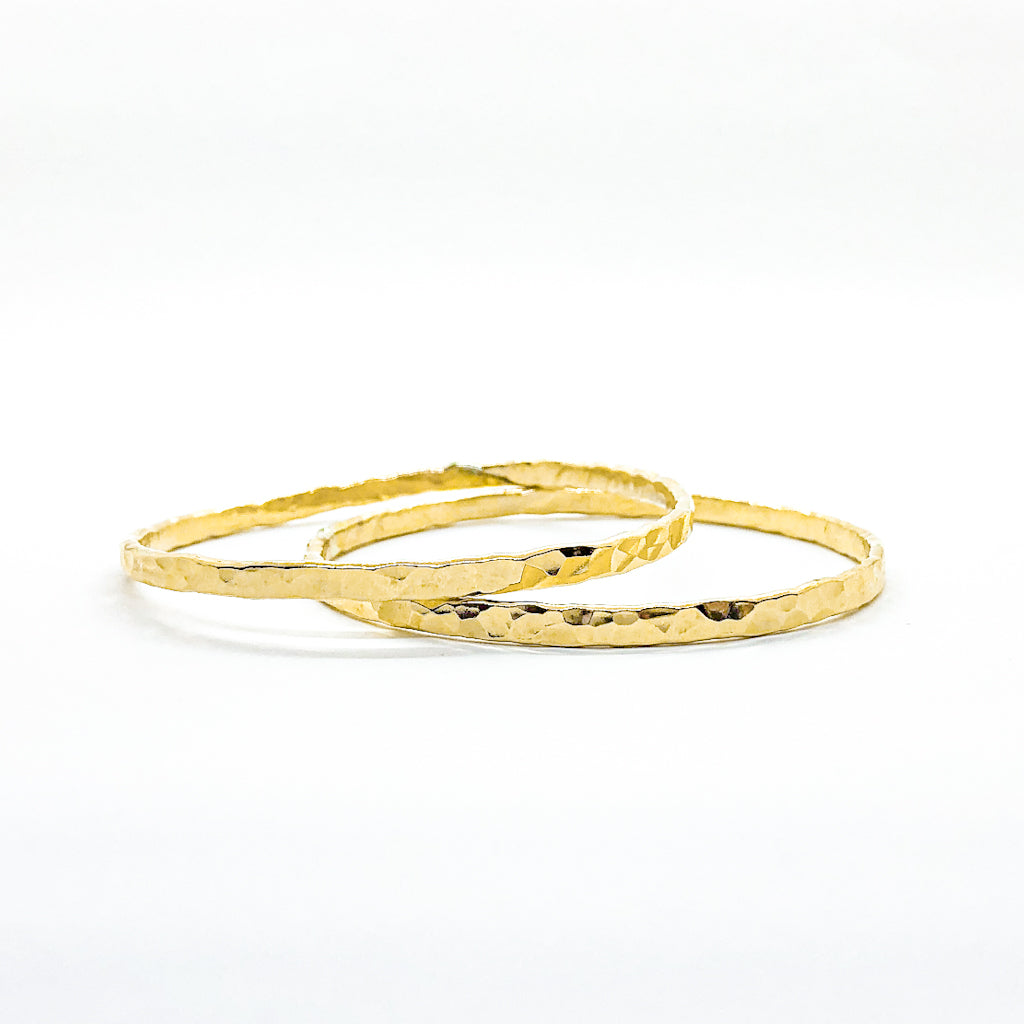 pair of 14k Gold Filled Ball Pein Hammered Bangle by Judie Raiford