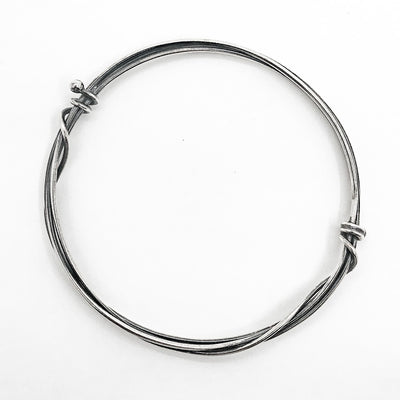 over top view of Wrapped Oxidized Sterling Bangle by Judie Raiford