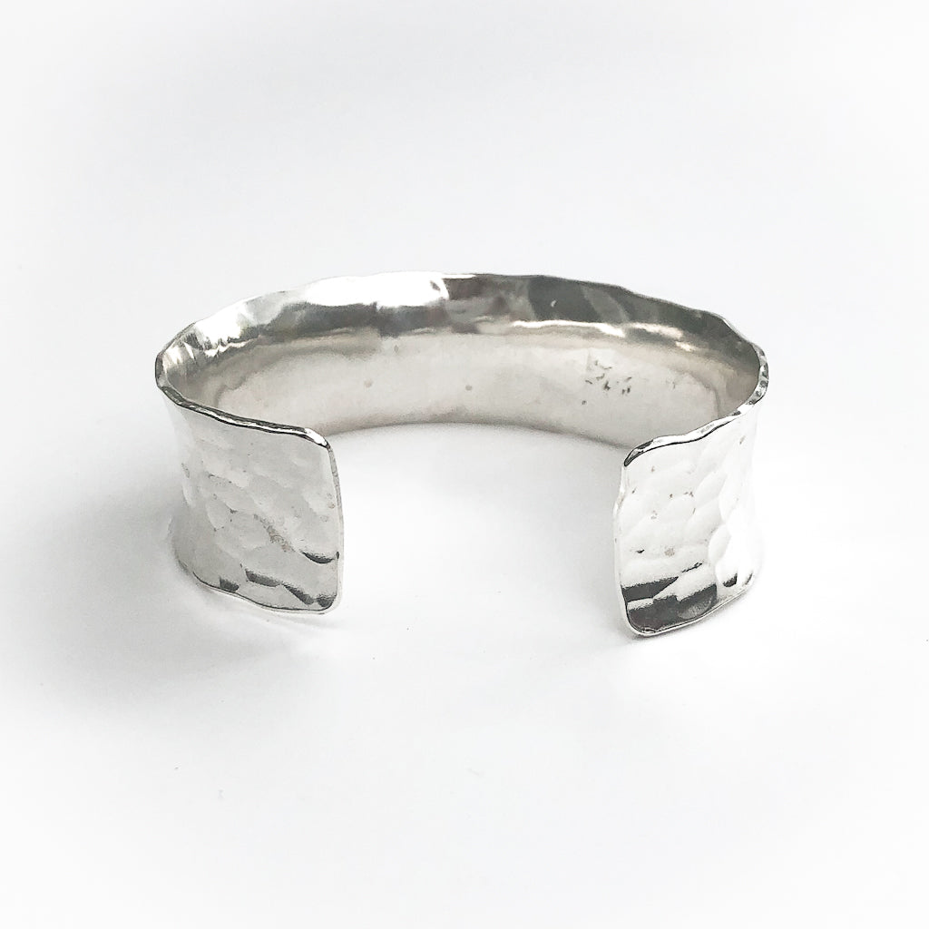 back view of Sterling Anticlastic Ball Pein Cuff by Judie Raiford