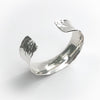 angle view of Sterling Anticlastic Ball Pein Cuff by Judie Raiford