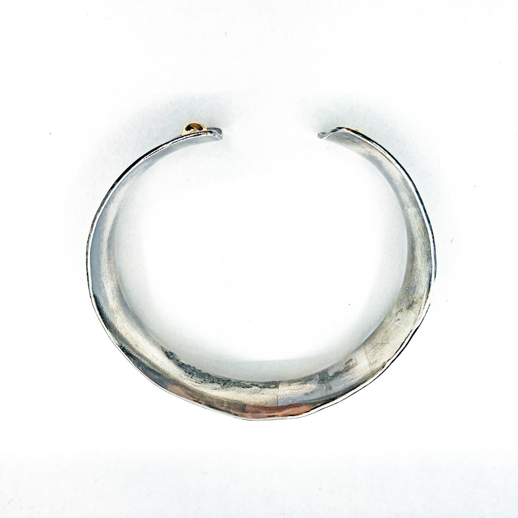 over top view of 3/4" Mom's Hammer Oxidized Sterling Anticlastic Cuff with 14k Gold Balls by Judie Raiford