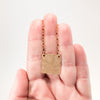 14k Gold Filled Mom's Hammer Square Necklace by Judie Raiford held in hand