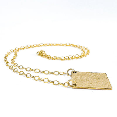 side angle view of 14k Gold Filled Mom's Hammer Square Necklace by Judie Raiford