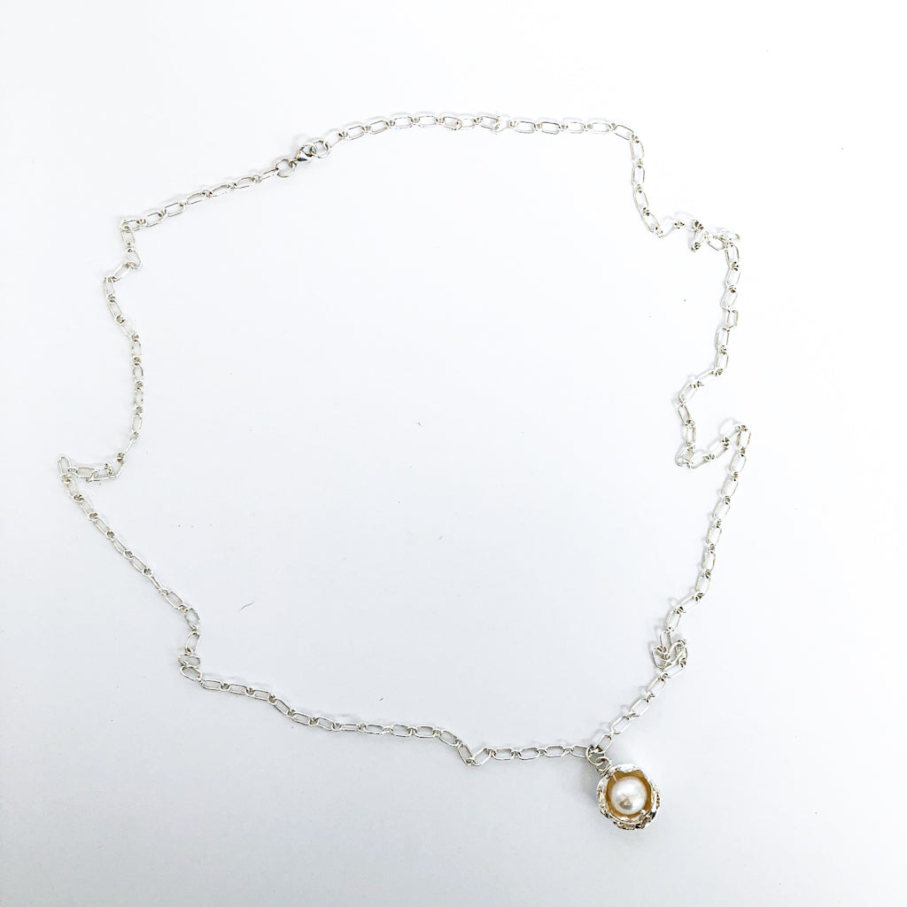 Flat view of Water Drop Pearl Necklace by Judie Raiford