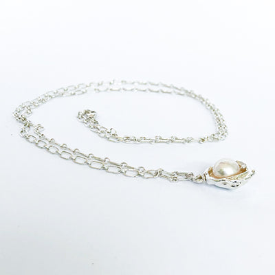 side angle view of Water Drop Pearl Necklace by Judie Raiford