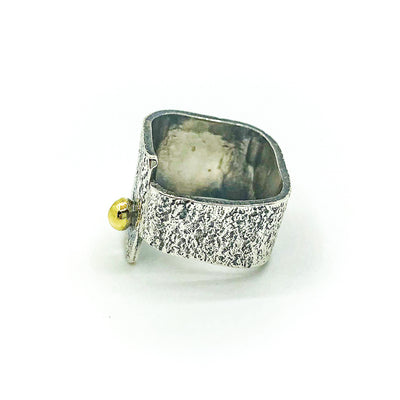 left side view of size 7 Sterling Mom's Hammer Crotch Hugger Ring with 14k Gold Ball by Judie Raiford
