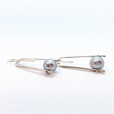 side angle view of Short Tic Toc Earrings with Gray Pearls by Judie Raiford