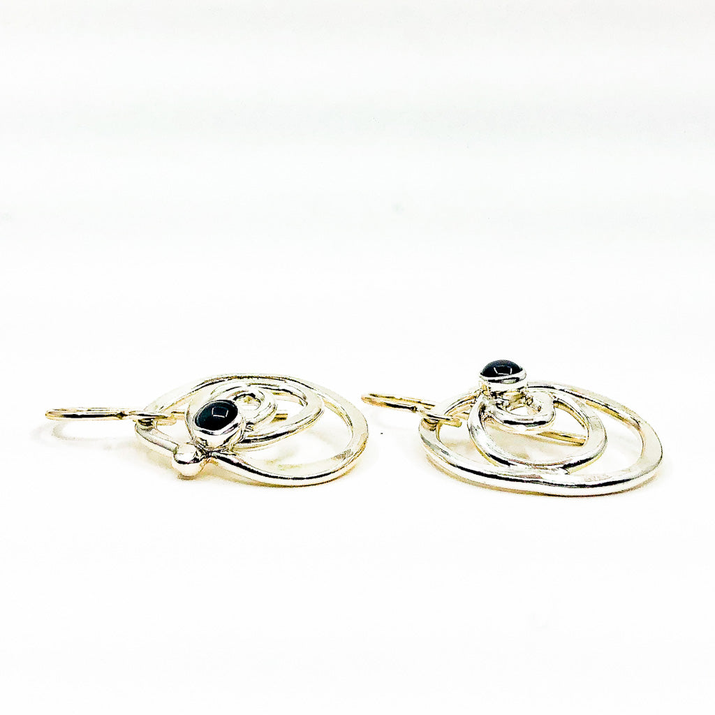 side angle view of Sterling Mini Spiral Earrings with Black Onyx by Judie Raiford