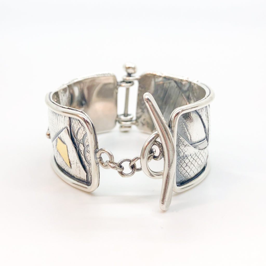 detail of clasp view of sterling silver and 24k gold Flashed and Fused Bracelet by Judie Raiford