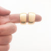 14k Gold Filled Wedding Ring Hoop Earrings by Judie Raiford hanging on finger