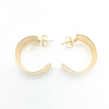 flat lay view of 14k Gold Filled Wedding Ring Hoop Earrings by Judie Raiford