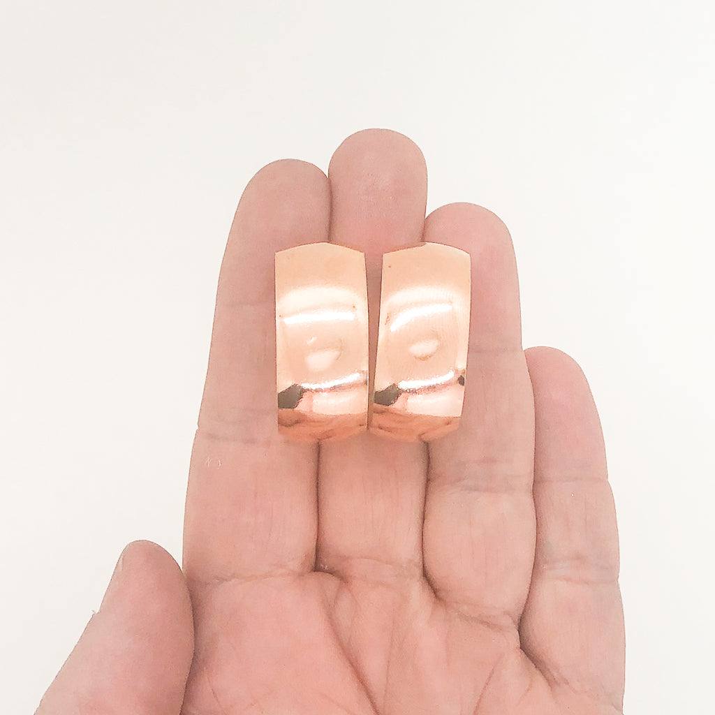 14k Rose Gold Filled Wedding Ring Hoop Earrings by Judie Raiford held in hand