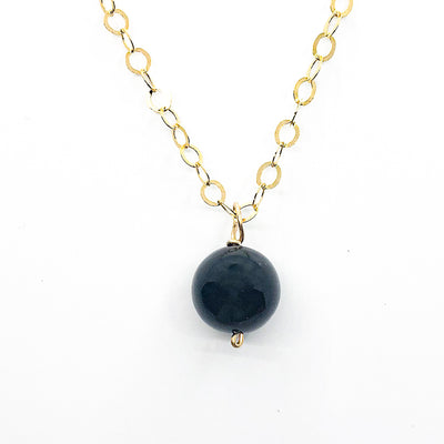 detail view of Black Onyx and 14k Gold Filled Necklace by Judie Raiford