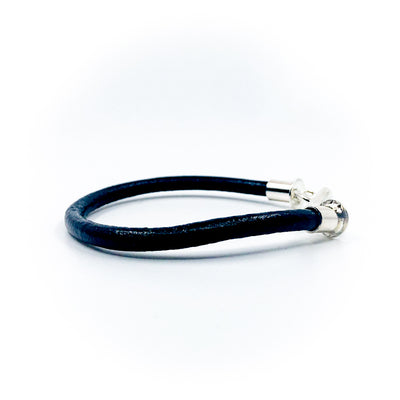 right side view of Men's Sterling and Black Leather Bracelet by Judie Raiford