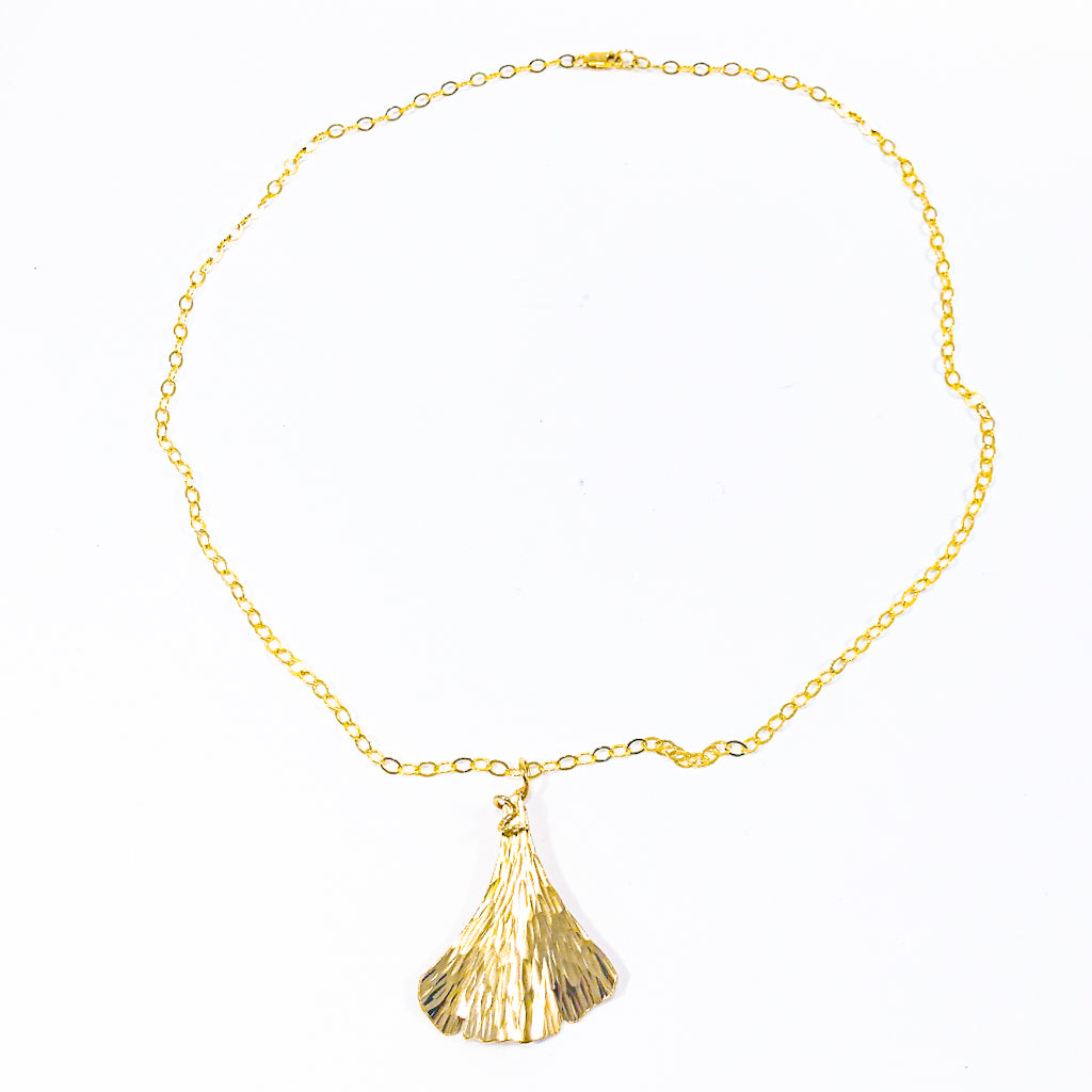 flat lay view of 14k Gold Filled Ginkgo Necklace by Judie Raiford