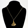 14k Gold Filled Ginkgo Necklace by Judie Raiford on black mannequin bust
