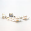 side angle view of Sterling and 24k Square Tip Big White Pearl Earrings by Judie Raiford