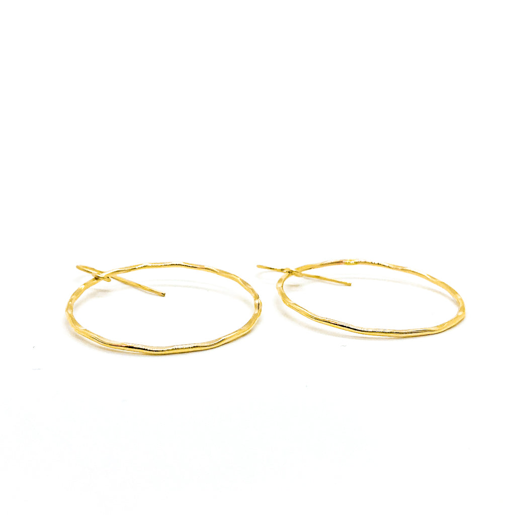 side angle view of 14k Gold Filled Large Orbit Earrings by Judie Raiford
