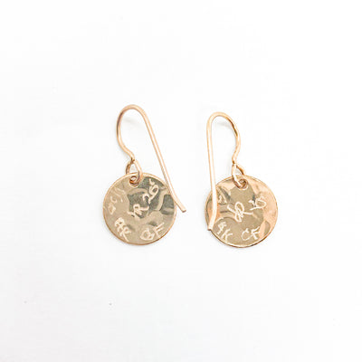 back side with artist signature of 14k Gold Filled ball Pein Hammered Mini Circle Earrings by Judie Raiford
