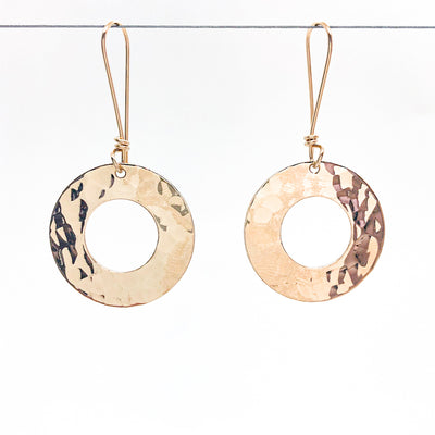 14k Gold Filled Ball Pein Donut Earrings on handmade wire by Judie Raiford hanging on wire