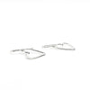 side angle view of Small Sterling Silver Hammered Open Heart Earrings by Judie Raiford