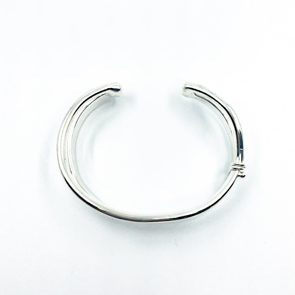 over top view of Sterling Craig Cuff by Judie Raiford