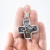Big Honker Cross Necklace by Judie Raiford held in hand